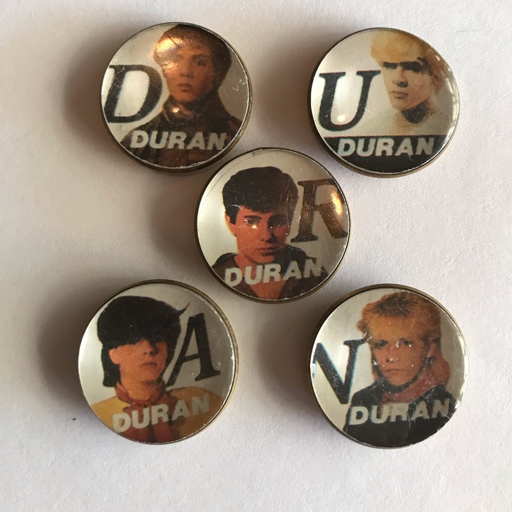 Set of 5 vintage Duran Duran band member pins, lacquered coating, 1983.